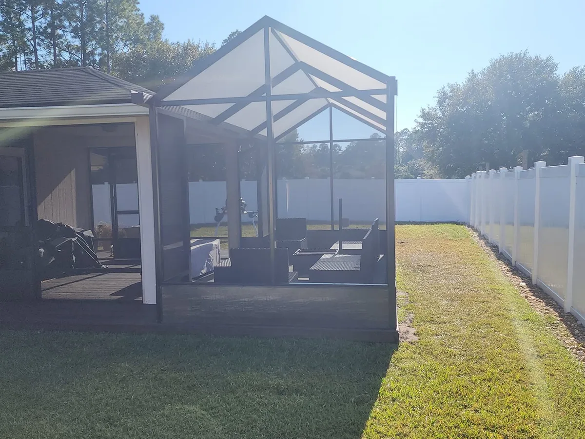 The same deck enclosed under a gabled screen enclosure, Greater Jacksonville FL
