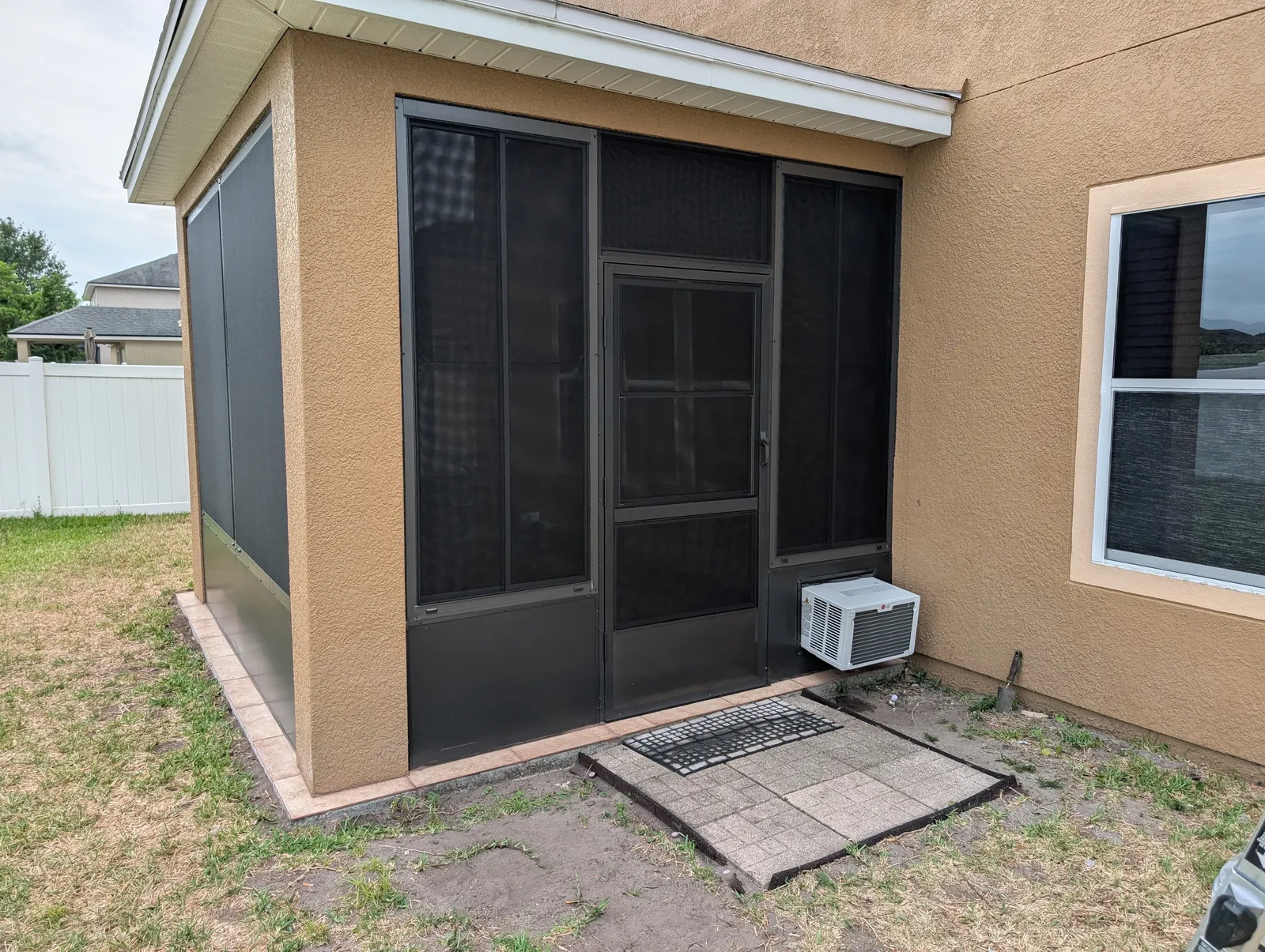 Screen enclosure over a paver patio, Greater Jacksonville FL